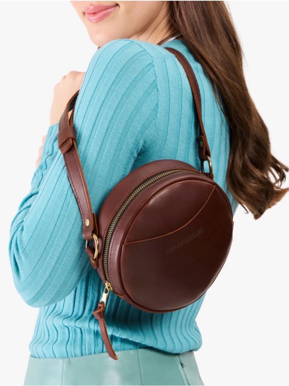 Portland Leather Round Crossbody Small Bag in Cognac color.